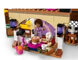 Minifigures enjoying a meal in Asha's Cottage.