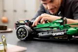 Man adjusting F1® car front bodywork.