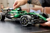 Man admiring completed F1® car.