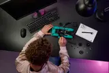 Boy building with digital instructions.