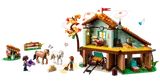 Interior view of horse stable with play features.