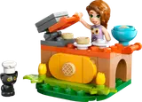 Minifigure and cat at waffle stand.