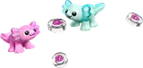 Close-up of Bubbles and Alba axolotl figures with printed tiles.
