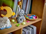 LEGO elephant with parts basket.