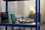LEGO DeLorean displayed on a shelf.