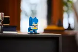 Blue Batman on shelf.