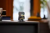 Dark Knight Returns on shelf.