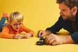 Father and child playing.