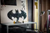 LEGO Batman Logo on display shelf.