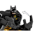 Batman in mech cockpit, opening mechanism.