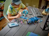 Kid building Battle Bus.