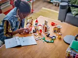 Child building the LEGO castle set.
