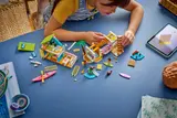Child building Beach House modules.