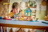 Child playing with the Beach House.