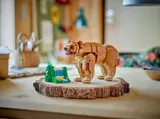 LEGO bear and waterfall on wooden base.