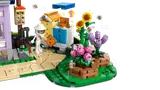 Opened LEGO Friends house interior and garden.