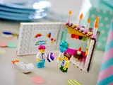 Close-up of opened LEGO cake interior with minifigures.