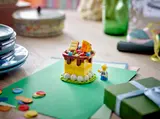 LEGO birthday cake on a party table.