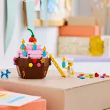 LEGO cupcake with custom decorations and chef.