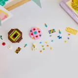 Exploded view of LEGO cupcake components.