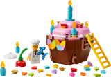 LEGO birthday cupcake set with chef minifigure and decorations.