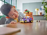 Child playing with Bowser and his car.