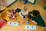 Kids building LEGO Bluey