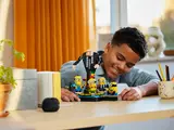 Person engaging with LEGO Gru set.