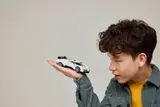 LEGO Bugatti held in hand.