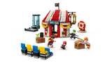 Alternative view of LEGO Buggy's Circus Tent with minifigures.