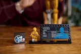 C-3PO minifigure, info plaque, and 25th anniversary tile.