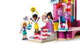 Friends minifigures at Ferris wheel base.