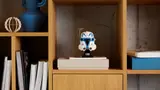 Captain Rex Helmet on bookshelf.