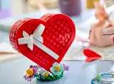 Heart box on a charmingly decorated table.