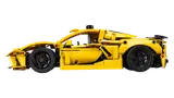 Corvette side view, yellow.