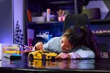 Child playing with Corvette.