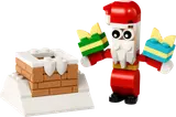 Brick-built Santa and chimney on snow.
