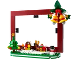 LEGO Christmas Picture Frame set 40702, red frame with a festive winter scene base and hanging bells.