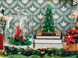 LEGO Christmas tree integrated into a holiday display.