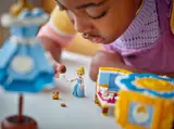 Child's close interaction with minifigures.