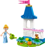 Cinderella in her garden with castle tower.