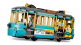Angled view of LEGO streetcar with minifigures inside.