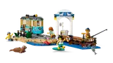 LEGO City Beach Streetcar set with minifigures surfing and fishing.
