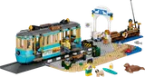 LEGO City Classic Beach Streetcar set with tram, beach, pier, and minifigures.