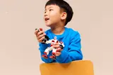 Child holding mech.