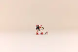 Mech and minifigure in wide shot.
