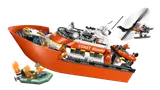 LEGO Coast Guard boat, helicopter, and burning dinghy in action.