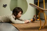 Child playing with Earth Dragon EVO.