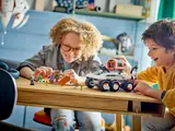 Children playing with LEGO 60432.