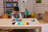 Child playing with LEGO